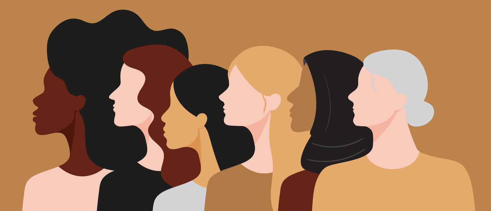 Women of different races and age standing together